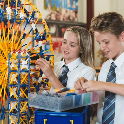 Students And Toy Ferris Wheel