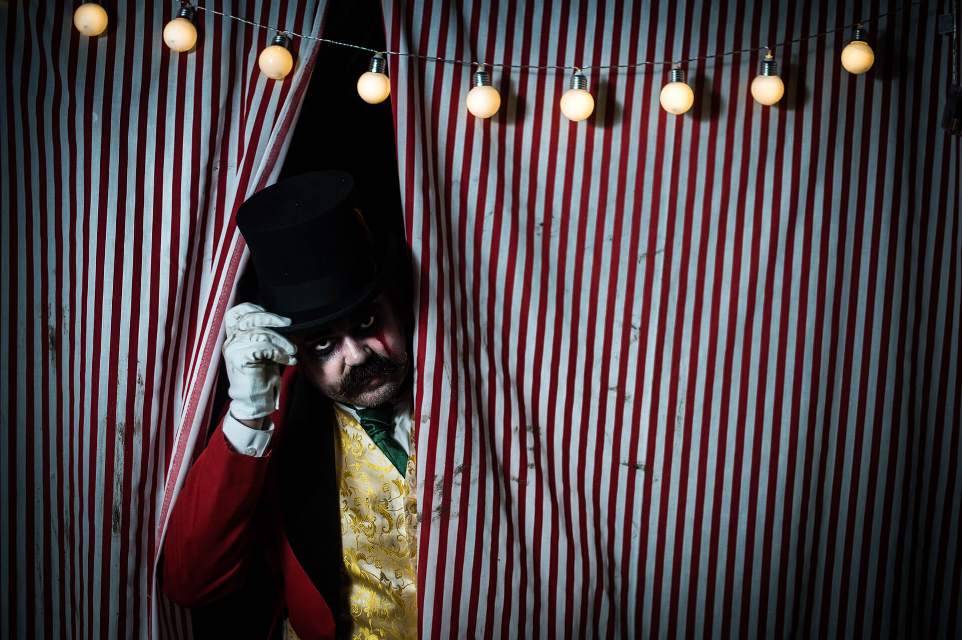 The Big Top Halloween Maze , Ringmaster Peeking Through Curtains