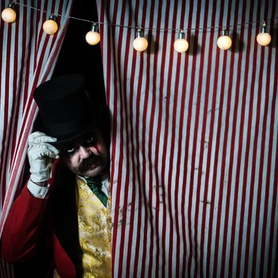 The Big Top Halloween Maze , Ringmaster Peeking Through Curtains