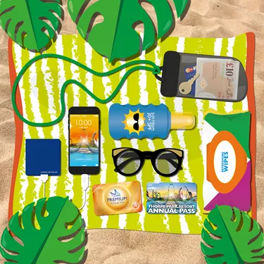 Beach Towel With Summer Essentials On It