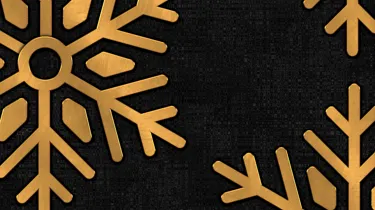 Gold snowflakes on black background