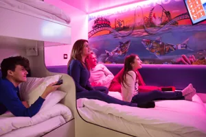 Thorpe Shark Cabins, family in a room