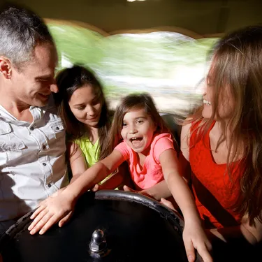 Family on Spinning Teacups Ride