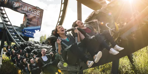 Close Up of guests on The Swarm Rollercoaster