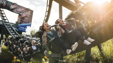 Close Up of guests on The Swarm Rollercoaster
