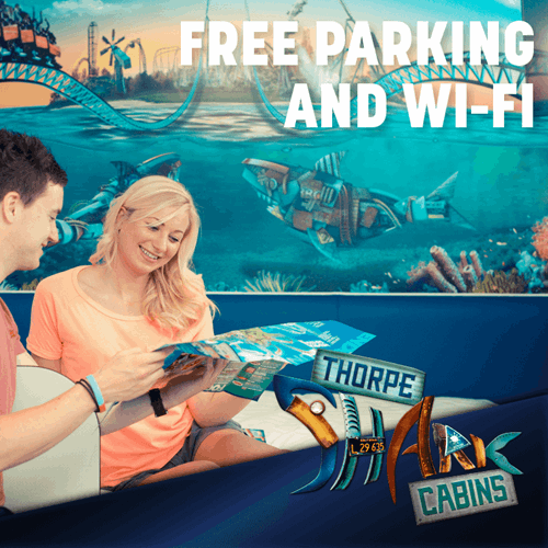 Free Parking And Wifi , Image Of Couple Looking At A Map